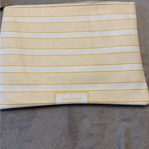 White and Gold Striped Pouch by Simplified